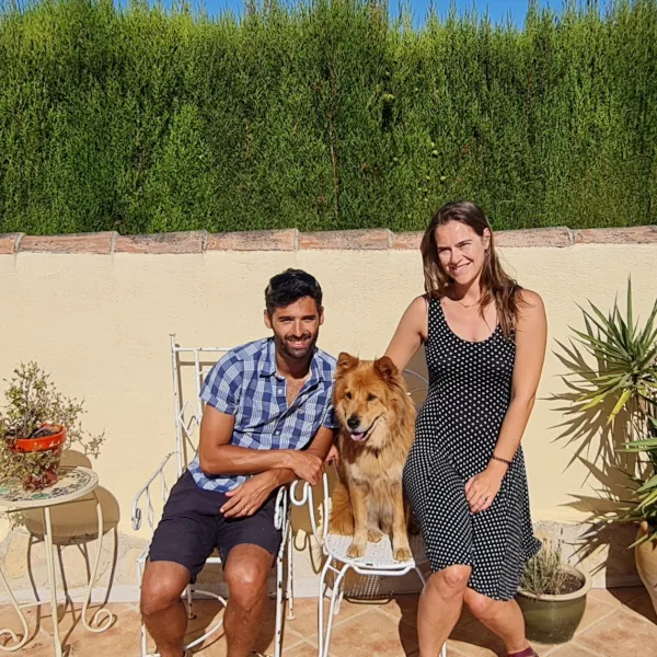 Guest couple with a large dog at Villa Lobos