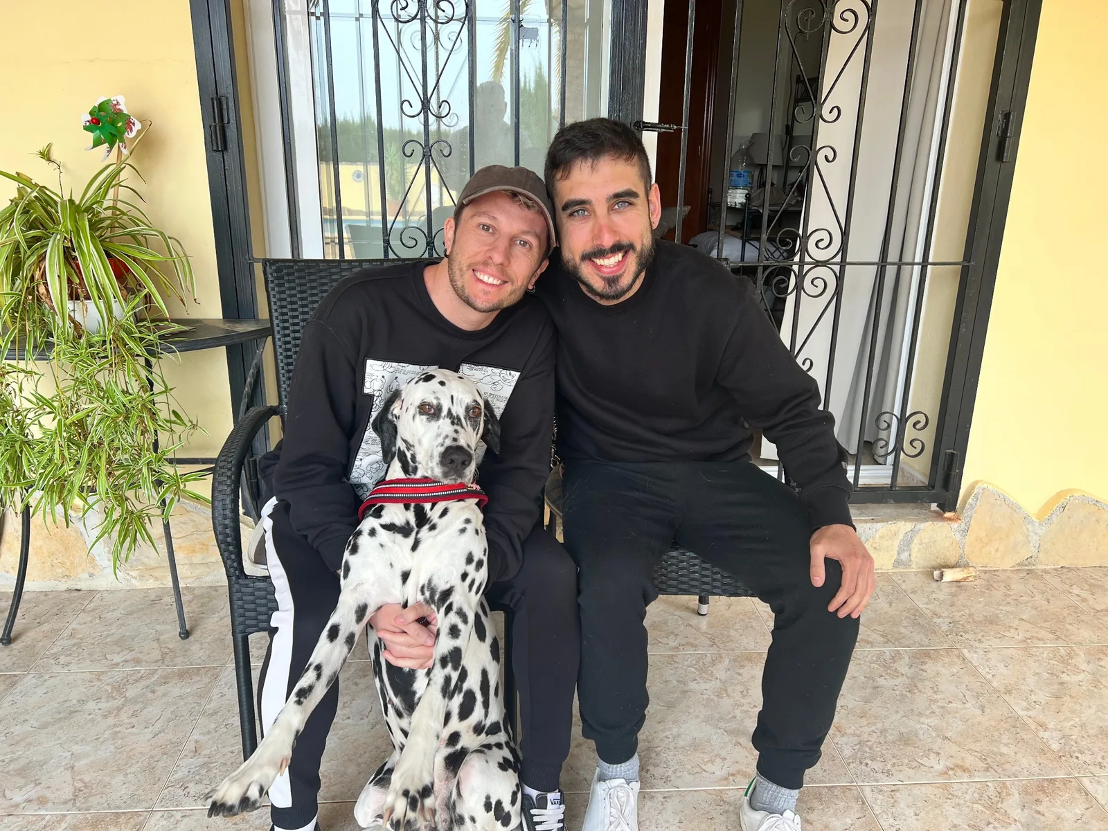 Guests with Dalmatian on the terrace at Villa Lobos
