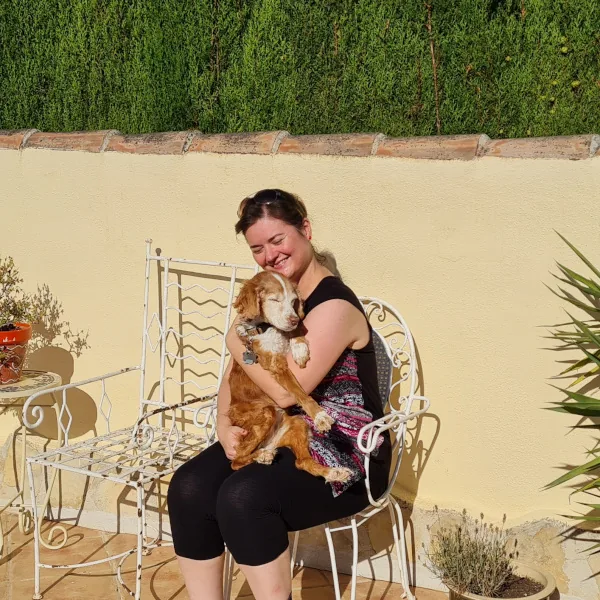 Guest hugging her dog at Villa Lobos